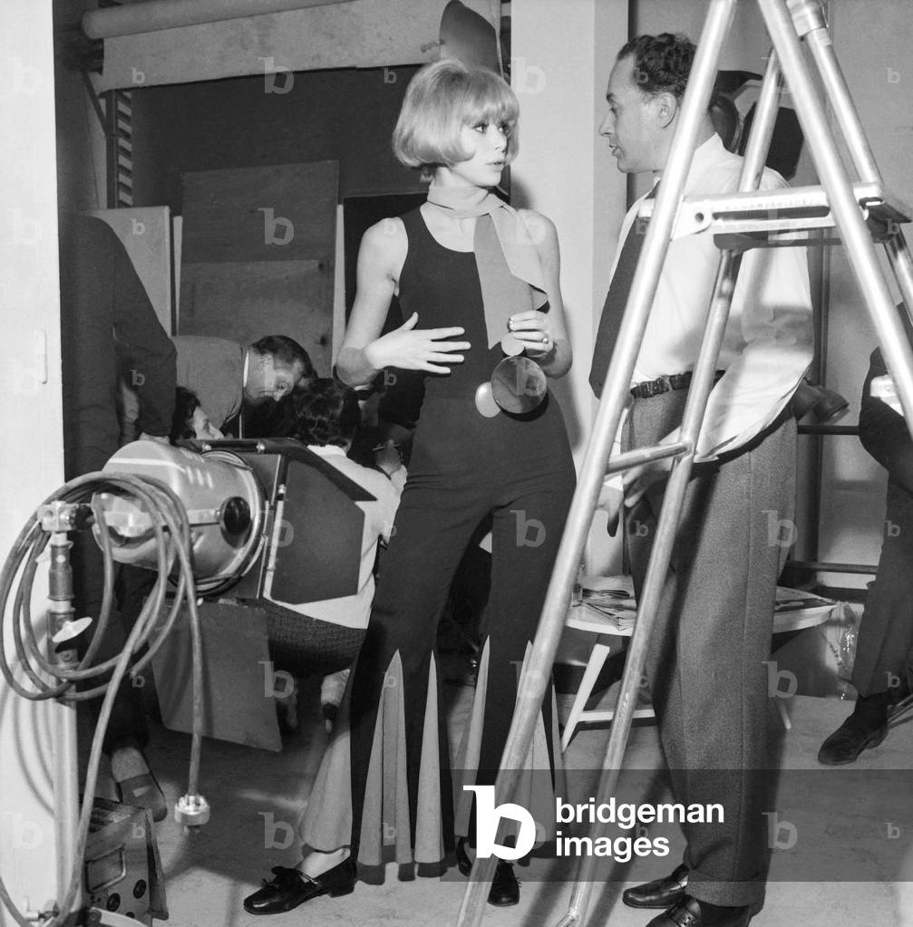 French director Pierre Gaspard Huit with actress Mireille Darc on set of film 