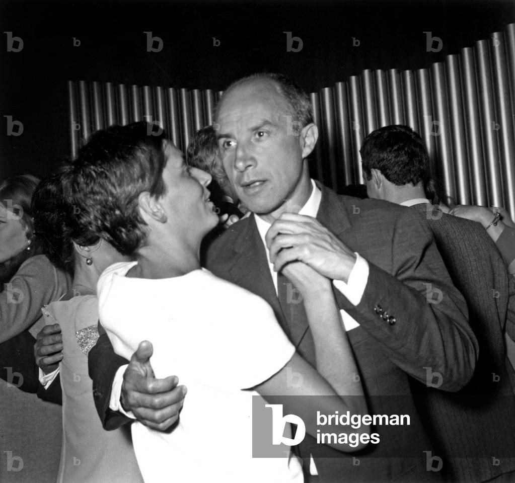 Andre Courreges (French couturier) dancing with his wife at the opening of Ruby's club, Paris, 16 March 1967 (photo)