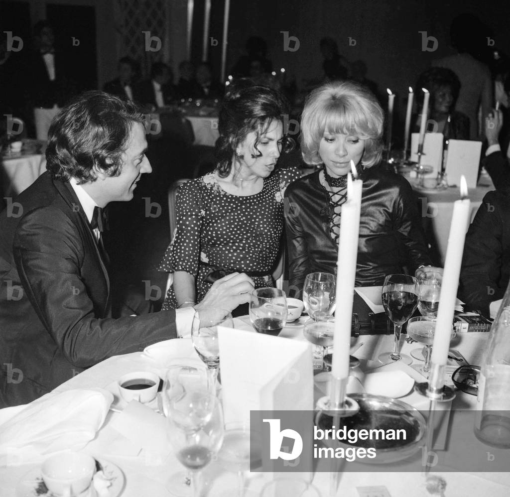 Jean Pierre Cassel, Mireille Darc (r), Paris, December 1st, 1970 (b/w photo)