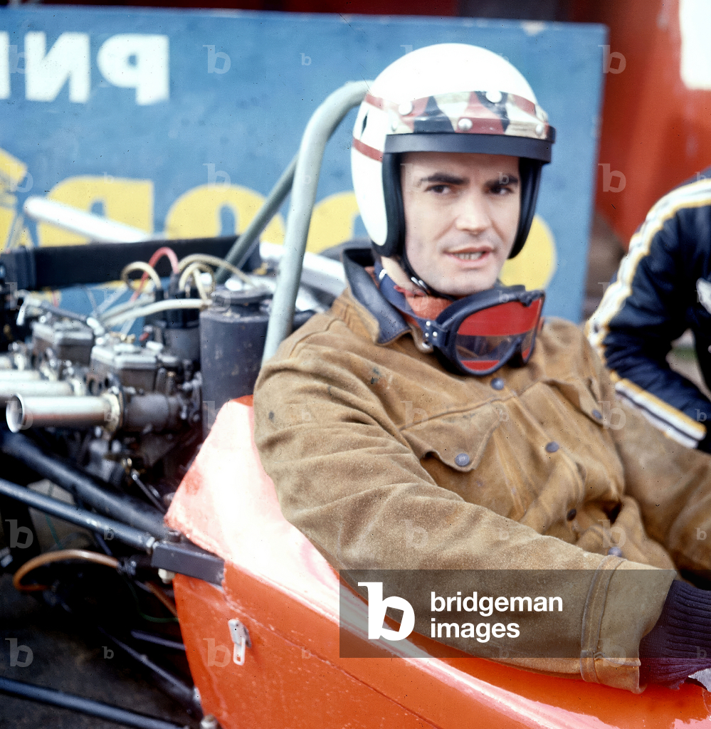 French actor Jean-Claude Drouot training on Le Mans circuit for the film 