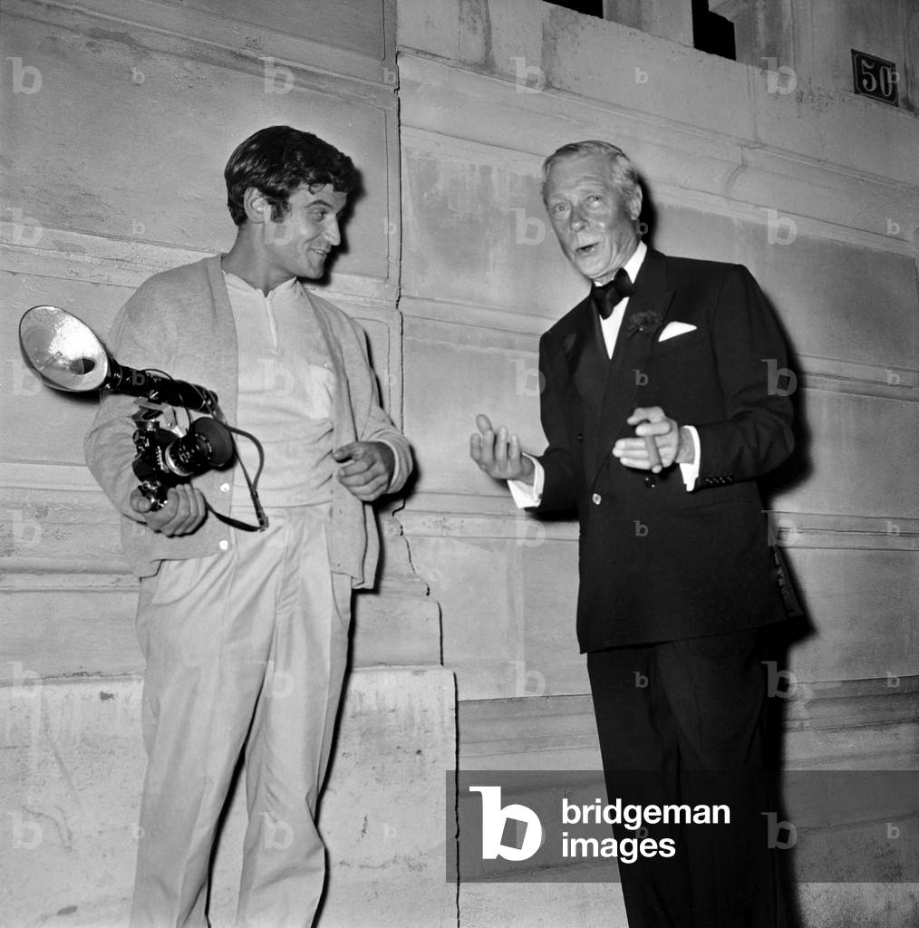 Duke of Windsor with a paparazzo during the Gala at the Opera of Paris for the Premiere of Franco Zeffirelli's Movie, 29 September 1967 (photo)
