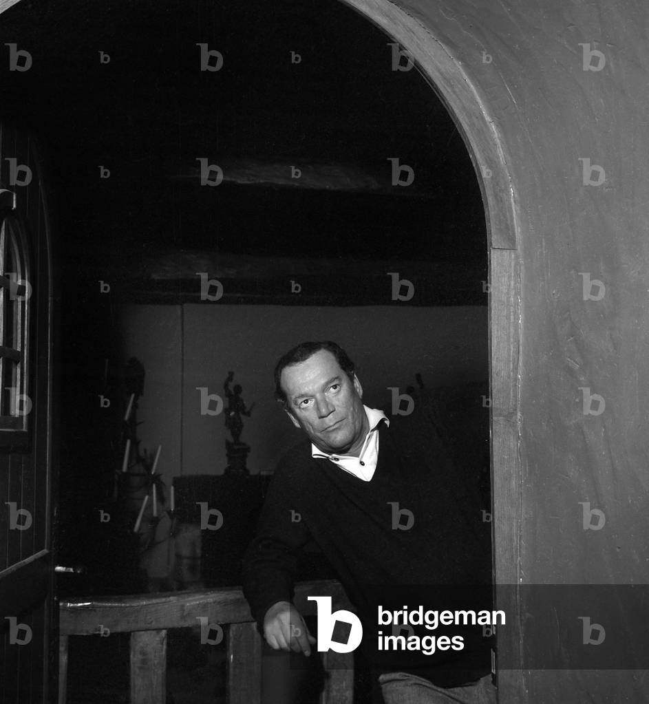 French Actor Eddie Constantine at home, 18 November 1962 (photo)