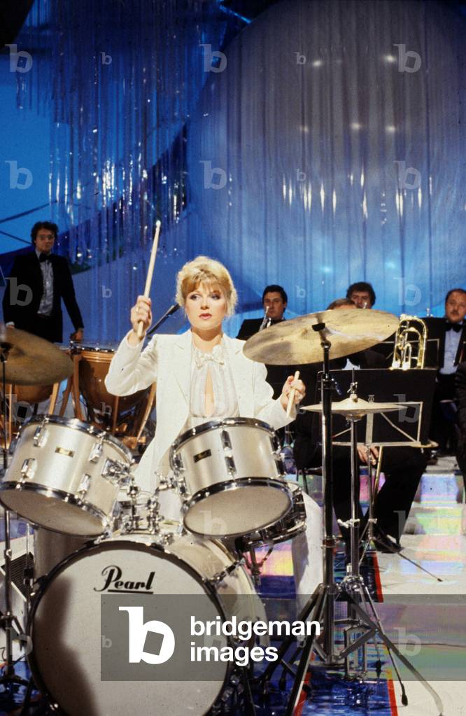 Singer Karen Cheryl on percussion during a TV Programme, June 1980 (photo)