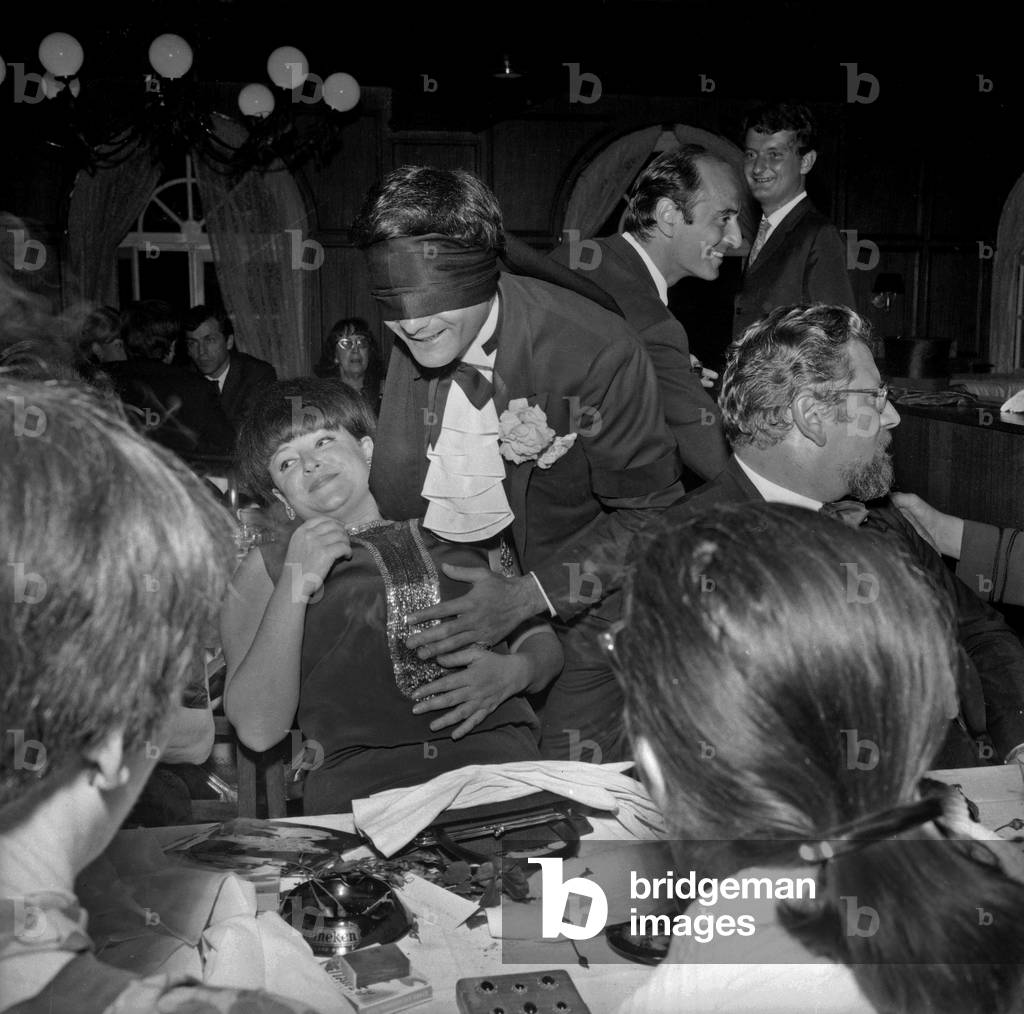 Jean Claude Brialy and Regine during the dinner given for the film 