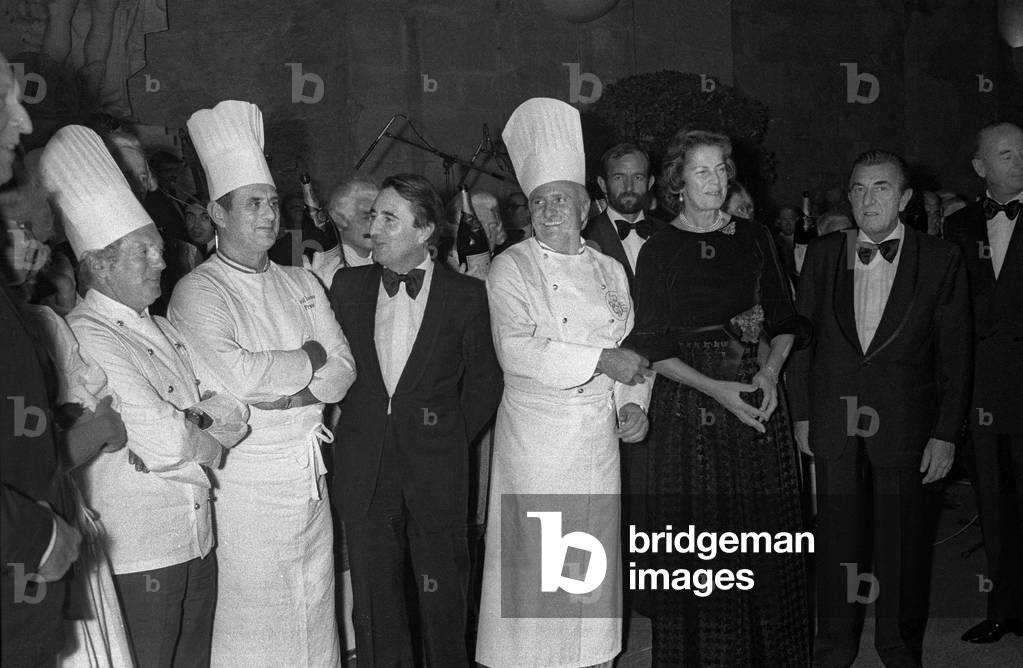 Party organized in Versailles by french politician Jean Pierre Soisson, May 1978 : l-r : cooks Gaston Lenotre, Paul Bocuse, Jean-Pierre Soisson, Roger Verge (b/w photo)