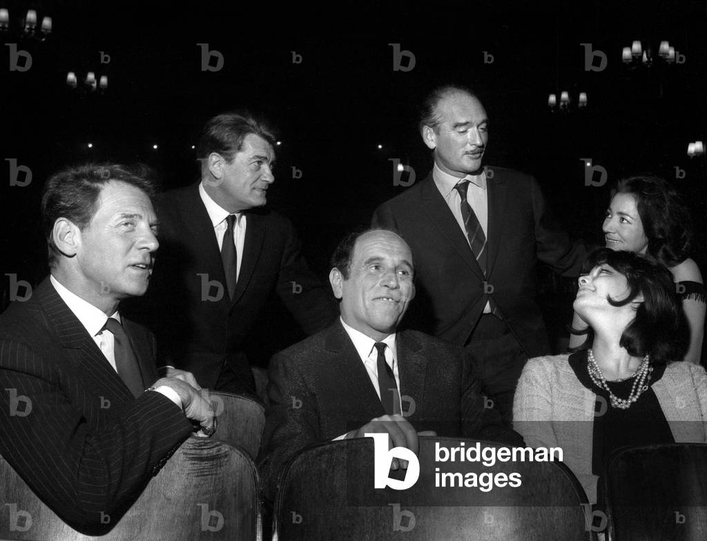Singer Leo Ferre presenting the new record with Jean Pierre Aumont, Jean Marais, Eddie Barclay, Claudine Coster and Tina Aumont Marquand (daughter of Jean-Pierre Aumont), 8 April 1964 (photo)