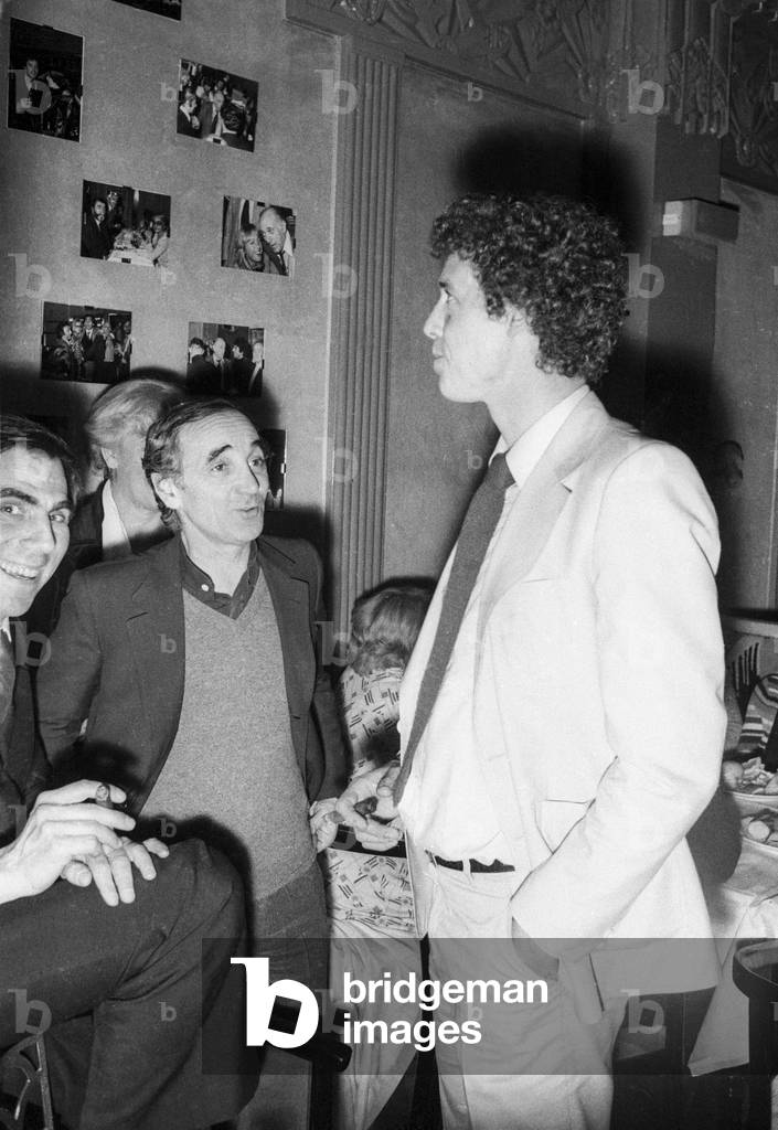 Charles Aznavour and Guy Drut  at the opening of restaurant 'Le Jardin d'Edgard', 1978 (b/w photo)