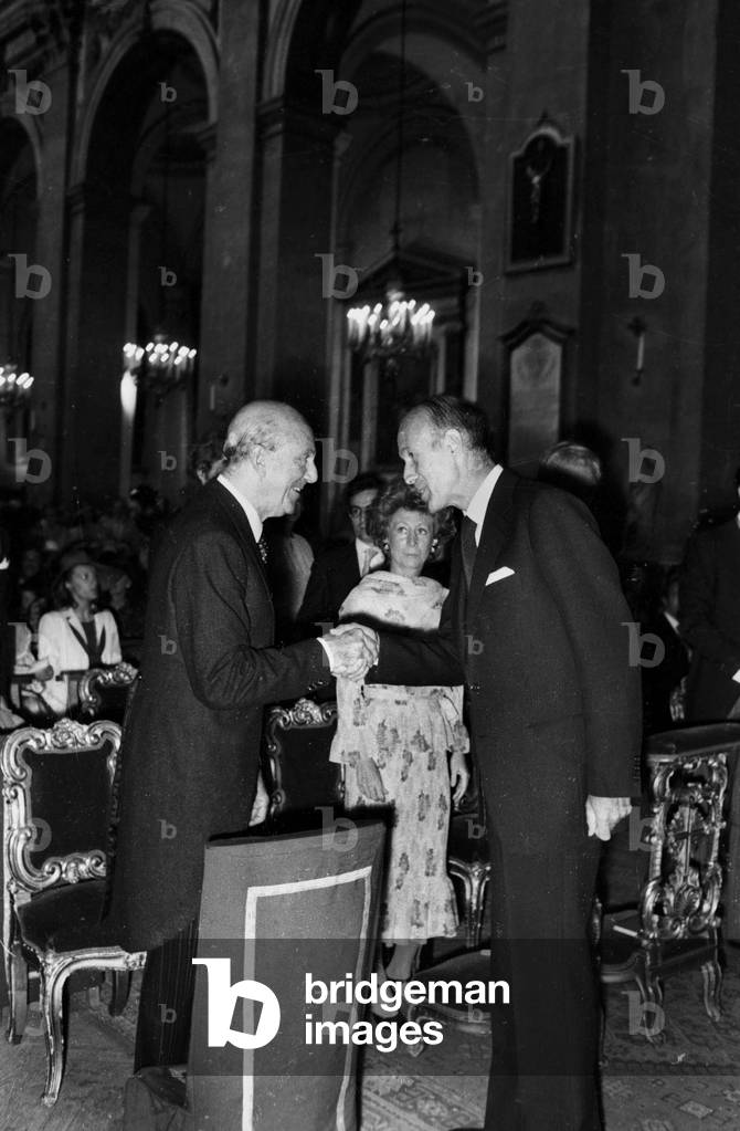 Umberto II (former king of Italy) shaking hands with French President Valery Giscard d' Estaing after the wedding of Princess Georgina, daughter of Prince de Faucigny-Lucinge, with son of Count Brandolini, Paris, 14 June  1975 (photo)