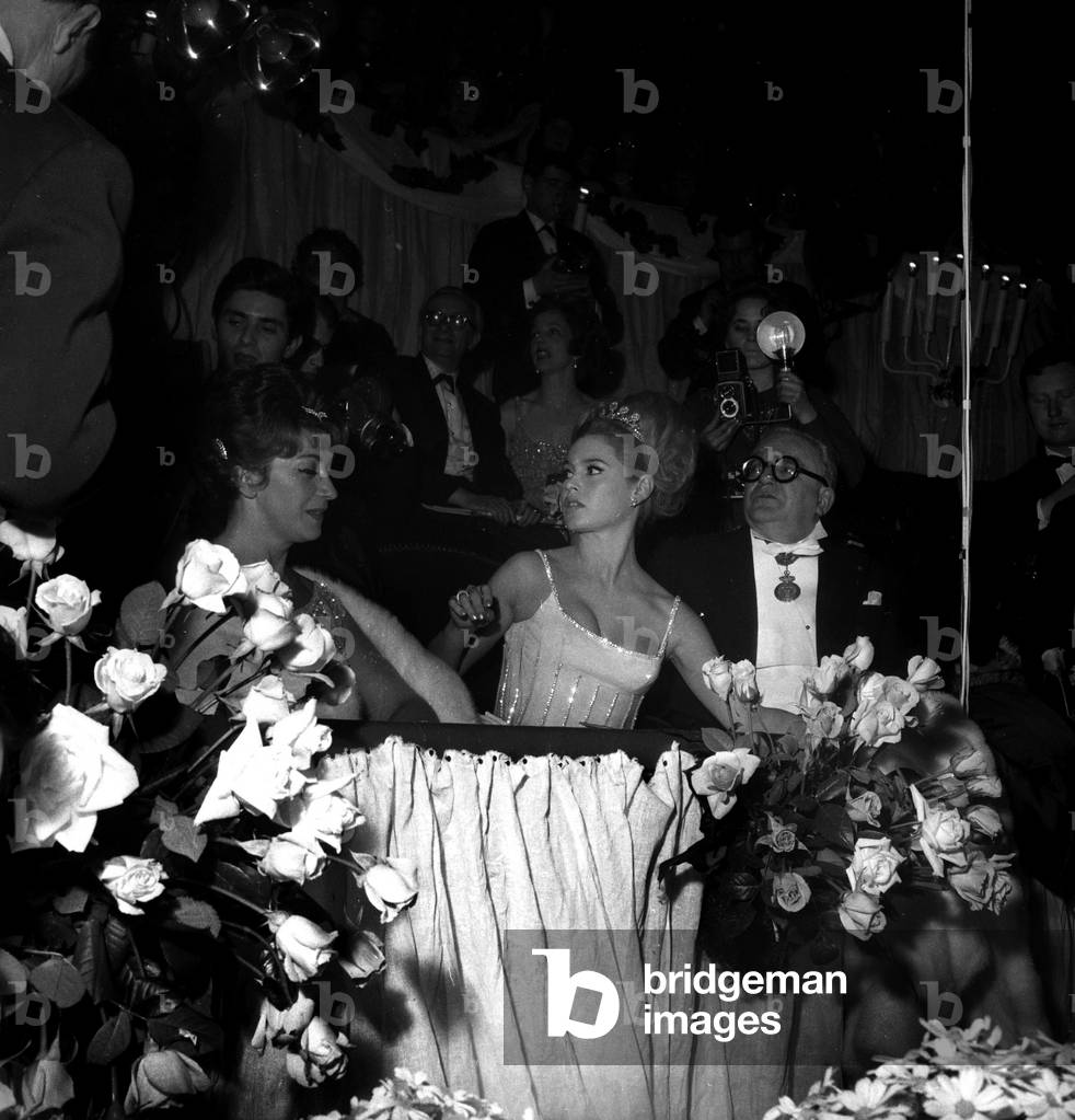 Brigitte Bardot, Marcel Achard and Sami Frey at the Gala of Artists, 1962 (b/w photo)