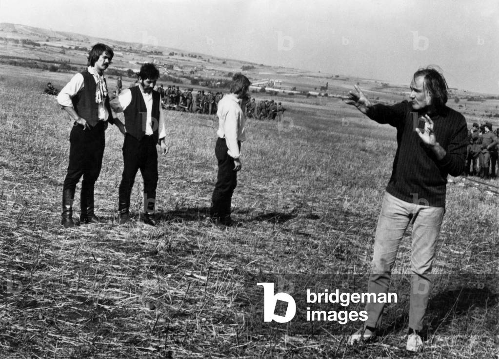 Miklos Jancso on set of Red Psalm (Meg ker a nep) 1972 (photo)