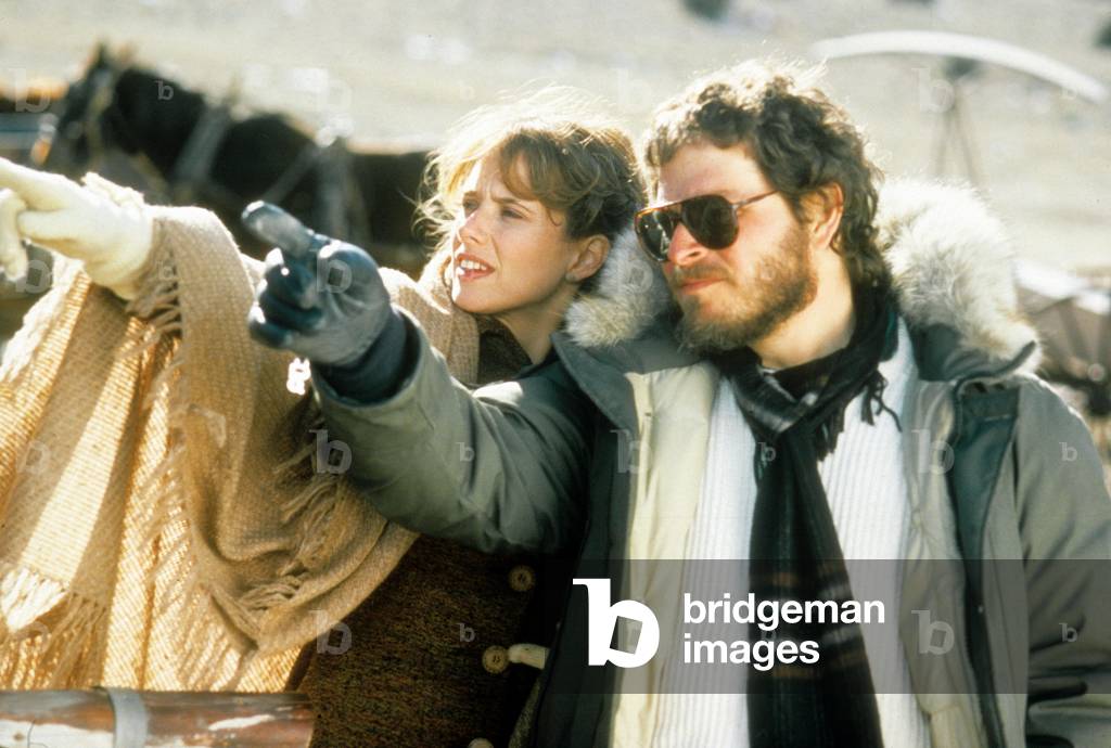 Lawrence Kasdan and Rosanna Arquette on set of SILVERADO, 1985 (photo)
