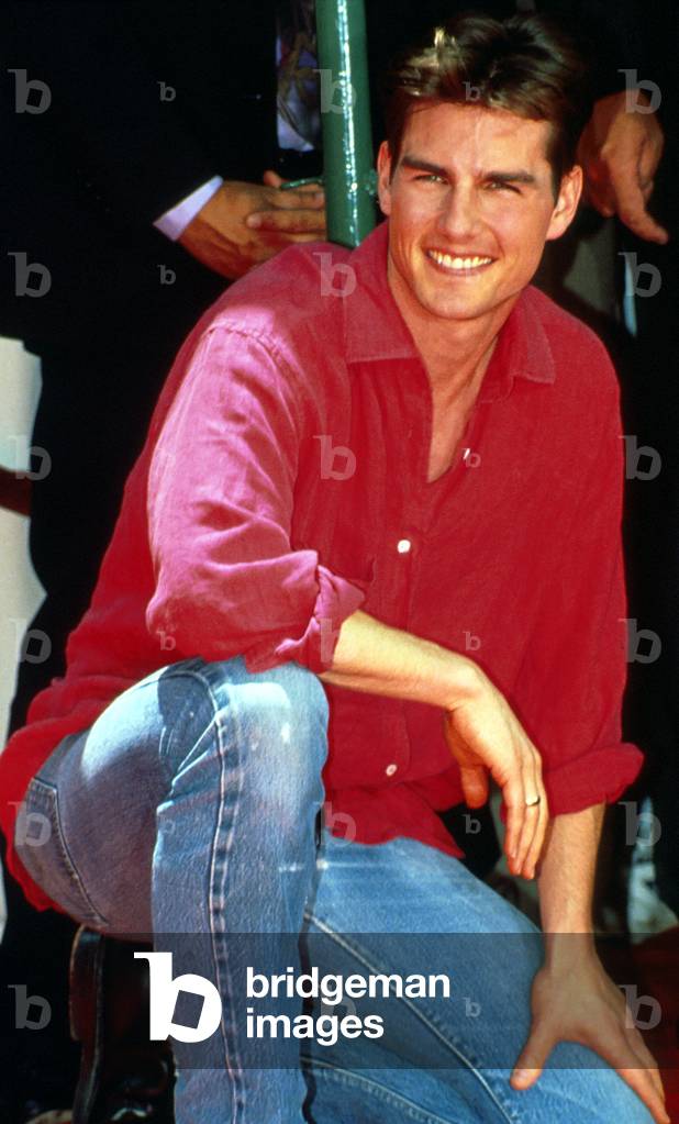 Tom Cruise at his hand/feet print Walk of Fame, 1993 (photo)