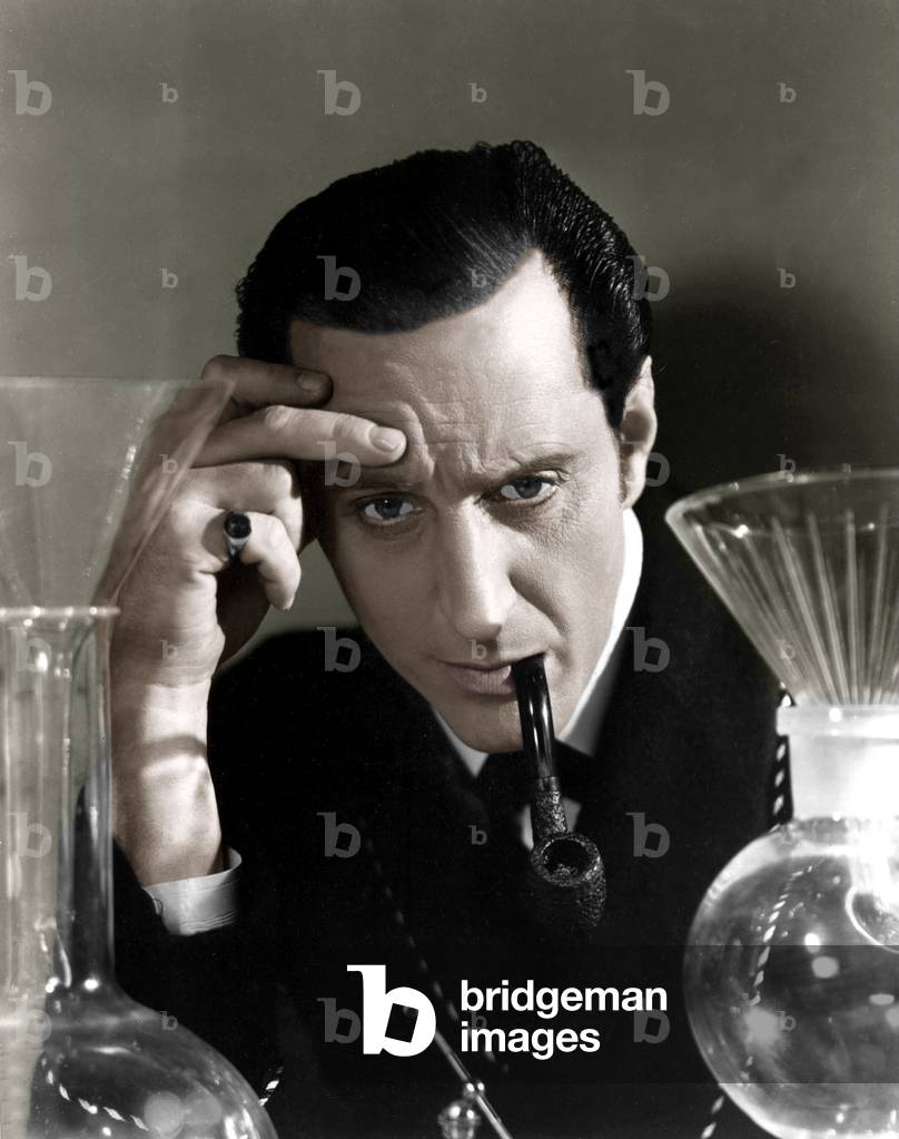Basil Rathbone is Sherlock Holmes in The Hound of the Baskerville, 1939 (photo)