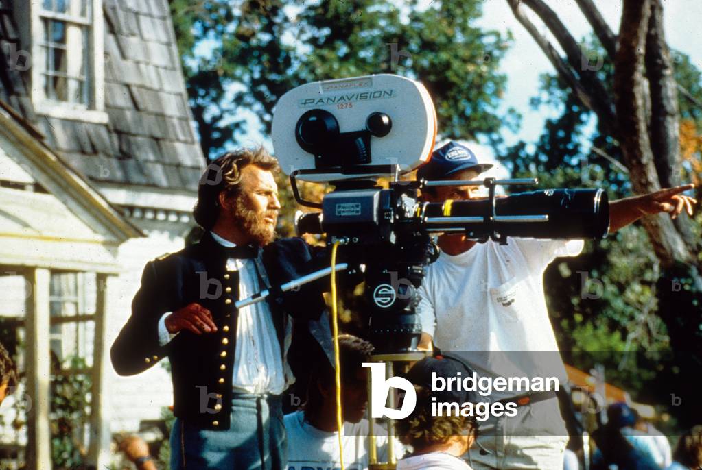 The director Kevin Costner on the set of Dance with the Wolves, 1990 (photo)