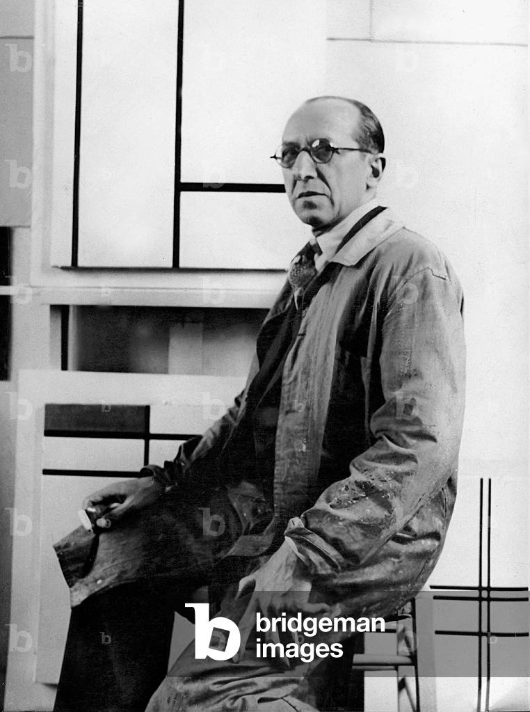 Piet Mondrian in his studio at 26 avenue du Depart, 1934 (b/w photo)