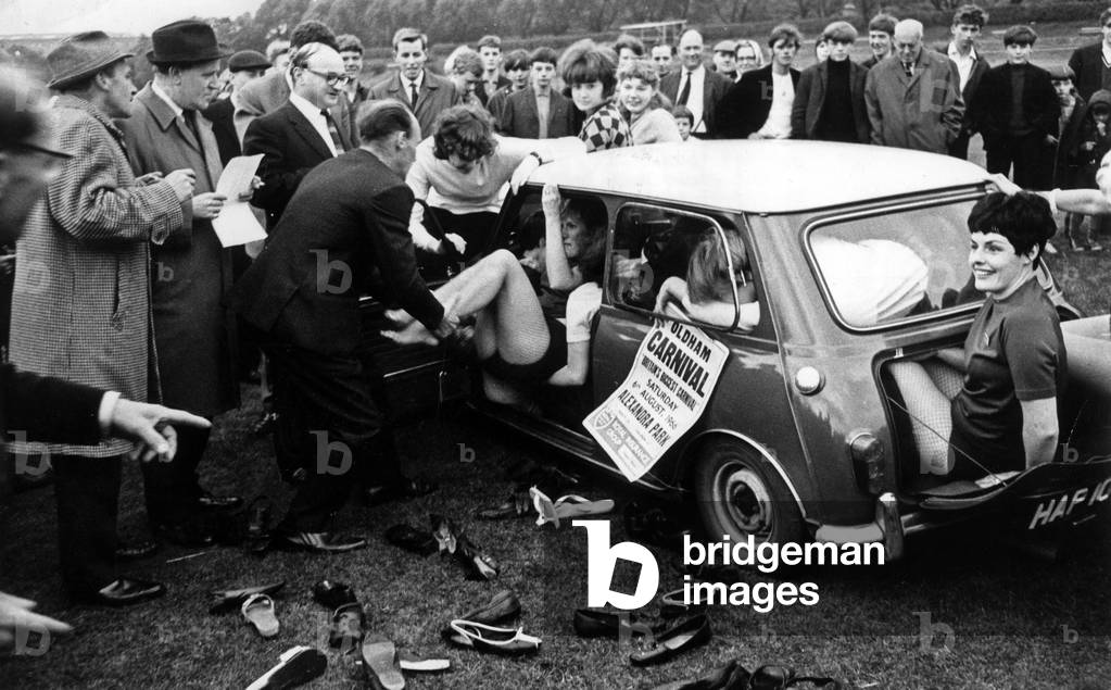 Contest for the greatest number of people in a mini Austin