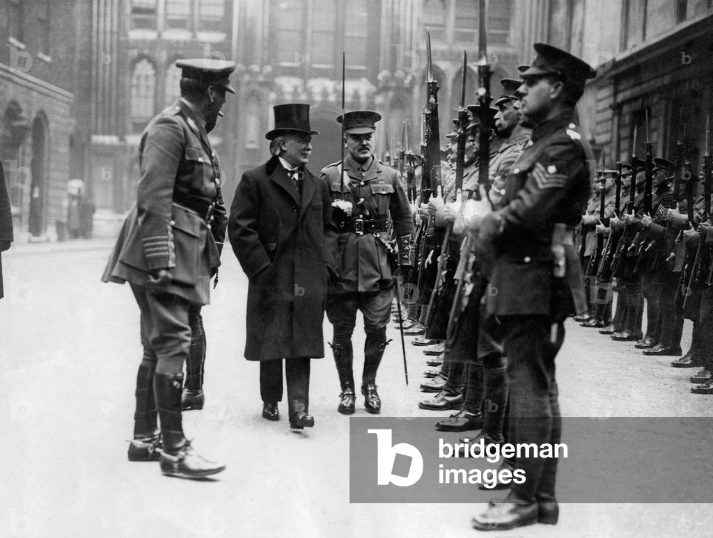David Lloyd George (1863-1945) British Prime Minister inspecting the guard of honour when he arrived at Guildhall in London