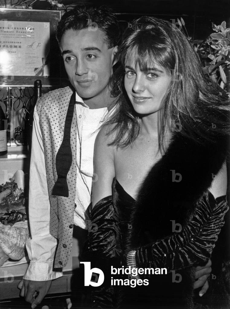 Andrew Ridgeley of Wham with his friend Donya Fiorentino in a club in London, 11 November 1986 (b/w photo)
