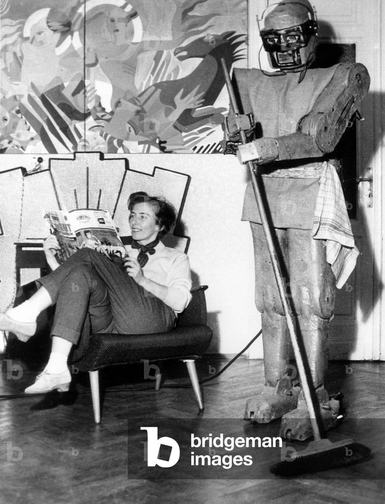 The Austrian Engineer Claus Scholz Has Created A Robot Which Can Do The Housework, here Mrs Scholz Has Nothing To Do, January 9, 1961 in Vienna (b/w photo)