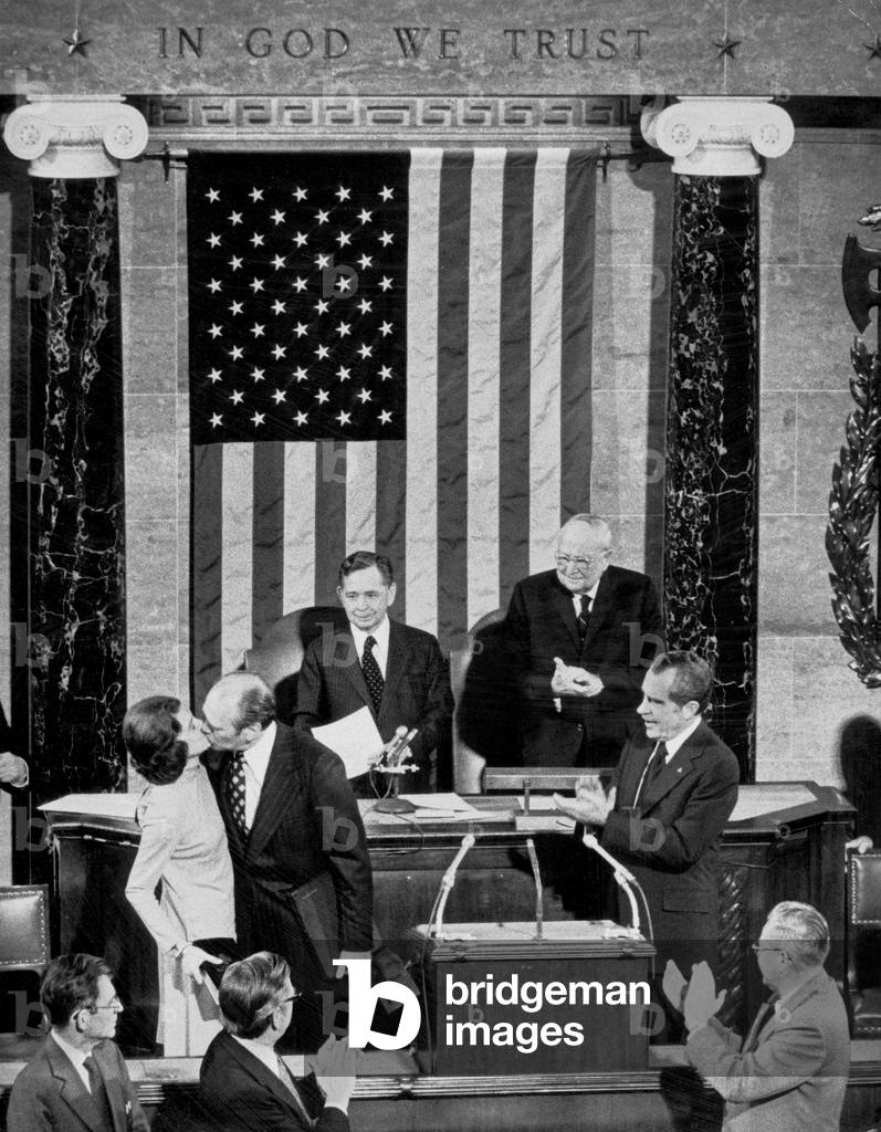 Newly Sworn in Vice-President Gerald Ford Kisses his Wife Betty To The Applause of President Richard Nixon and the Joint Session of Congress That Witnessed The Historic Event December 06, 1973 (b/w photo)