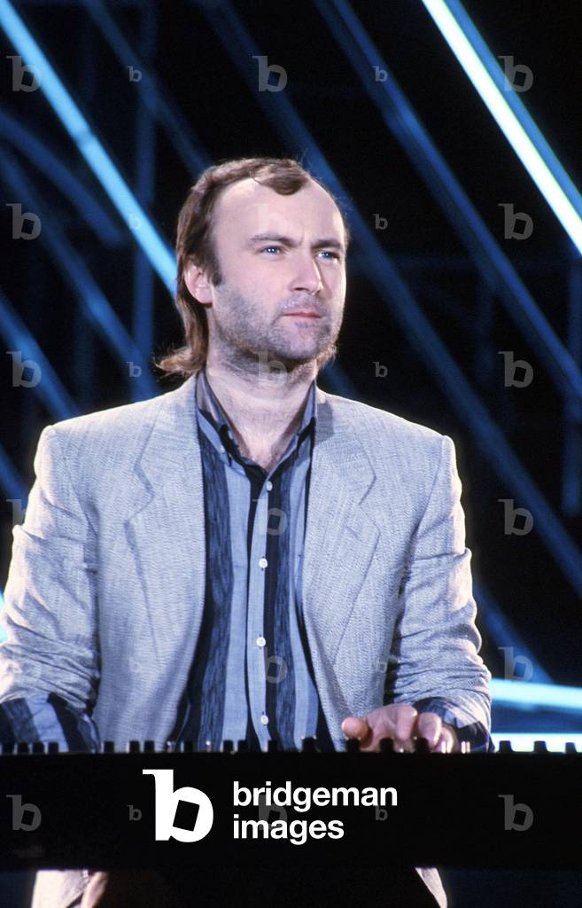 Singer Phil Collins on Stage March 6, 1985 Scene (photo)