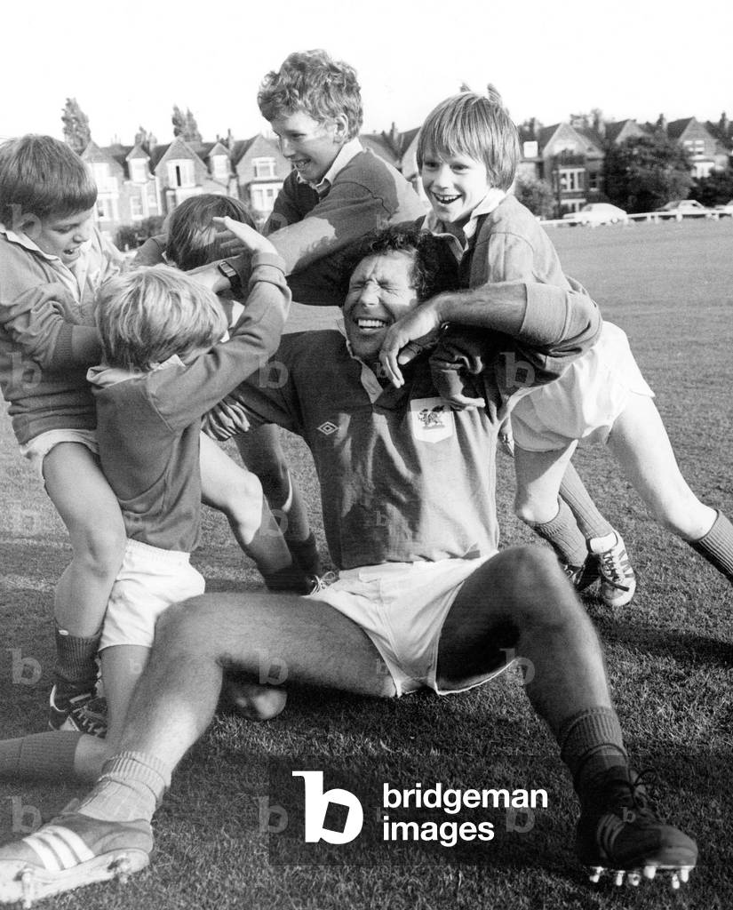 Singer Tom Jones Playing Rugby With Children in 1974 (b/w photo)