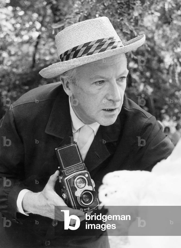 English Photographer Cecil Beaton (1904-1980) Holding Rolleiflex Camera (b/w photo)