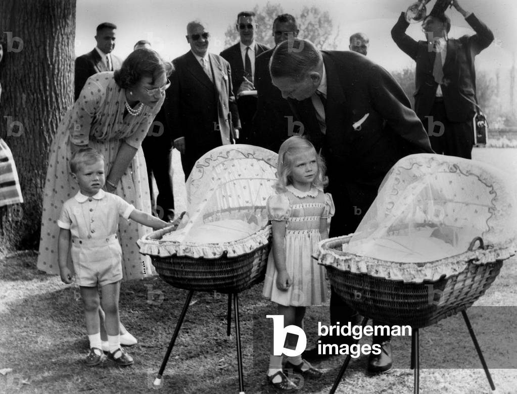 French president Rene Coty in Luxemburg with princess Marie Astrid (b. 1954, daughter of grand duke JeandeLuxembourg and princess JosephineCharlotte of Belgium) and her brother prince Henri (b. 1955, future grand duke of Luxemburg) at Petzdorf castle on june 22, 1957 (photo)