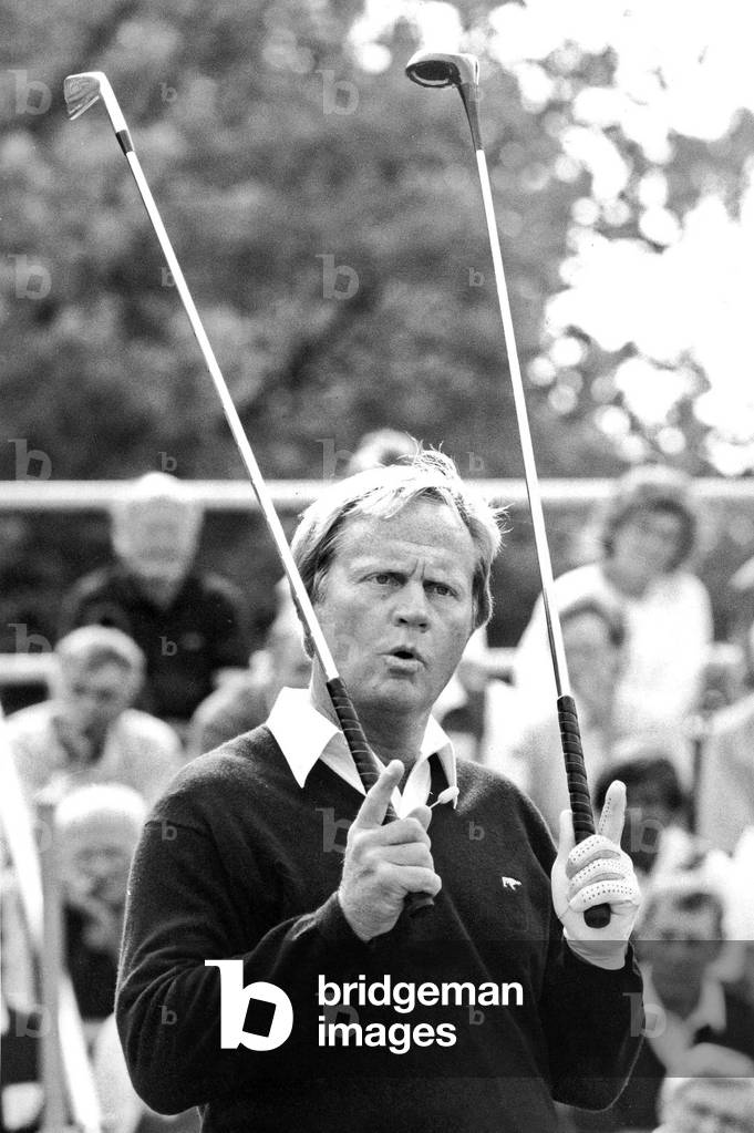 American Golfer Jack Nicklaus Explaining The Difference Between Wood Club (Right) and Iron Club July 9, 1987 Helsinki, Finland (b/w photo)