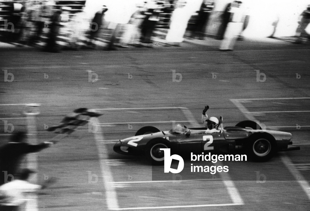 American Race Driver Phil Hill Driving A Ferrari Has Won Monza Grand Prize on September 12, 1961 (b/w photo)