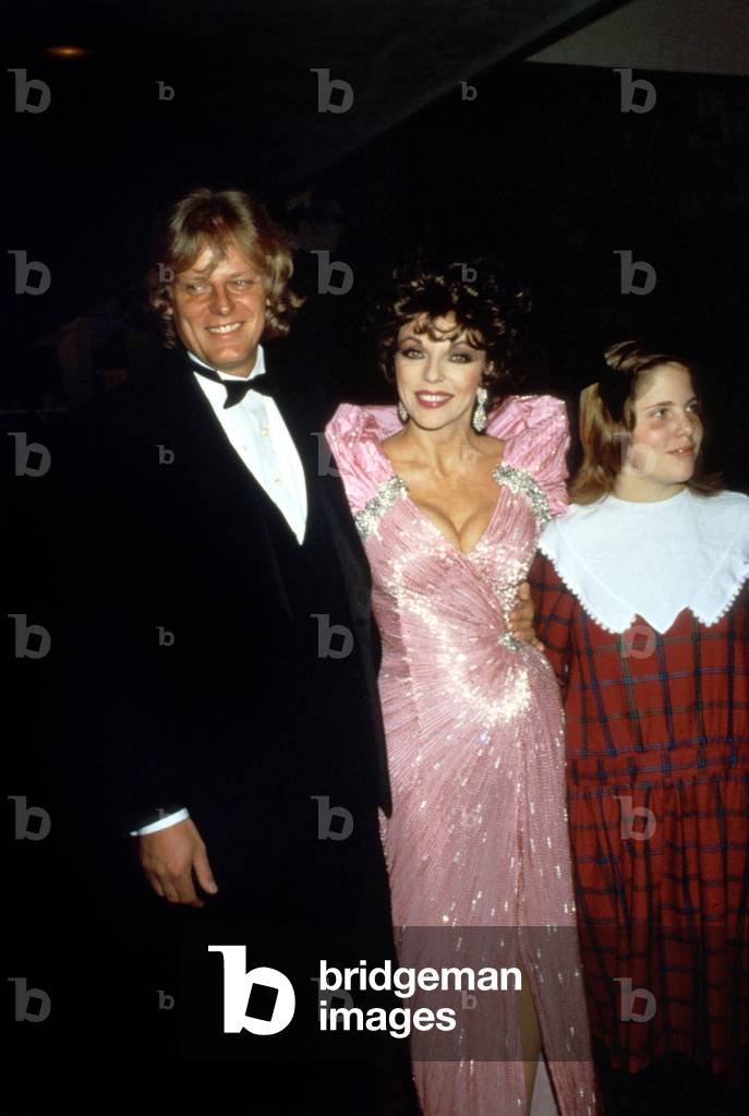 Peter Holm and Joan Collins With Their Daughter Katie C. 1985 (photo)
