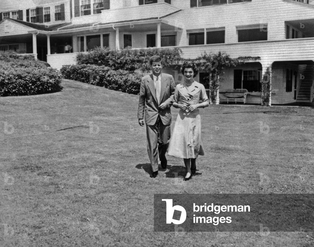 John and Jackie Kennedy Outside Their House in Hyannis Port (Massachusetts) Just After Their Wedding in September 1953 (b/w photo)