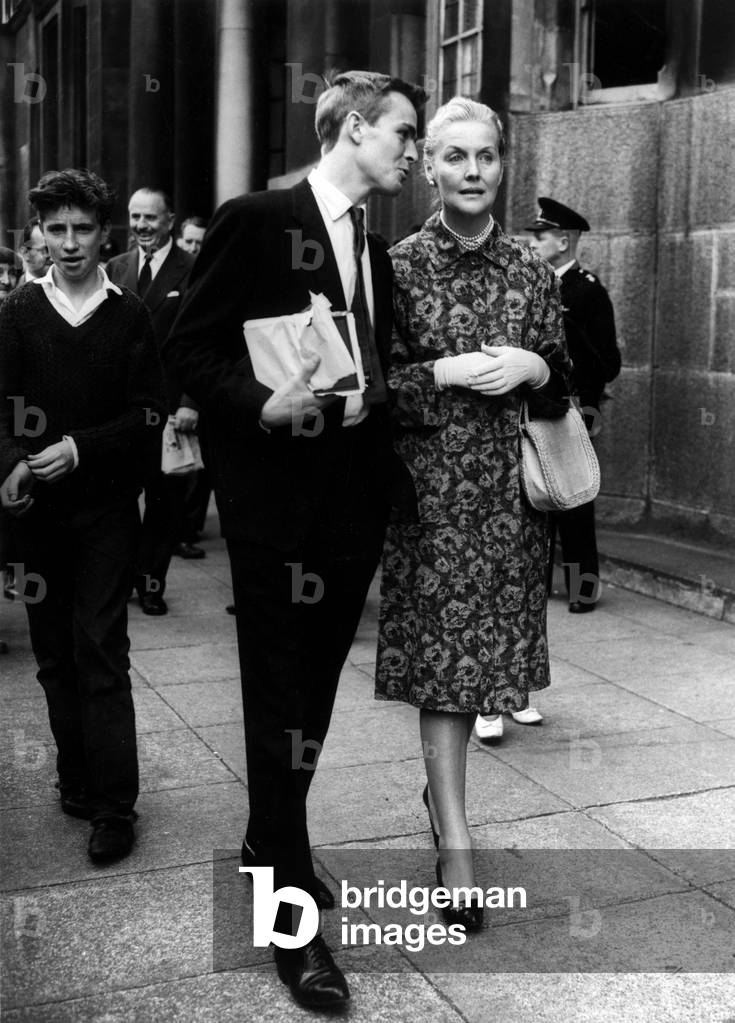 Lady Mosley (Nee Diana Mitford, Oswaldmosley's Wife) With Her Son Max Mosley On The Occasion Of A Meeting Of The British Union Of Fascists. on Apercoit Oswald Mosley Left By Max Mosley. August 1, 1962. (b/w photo)