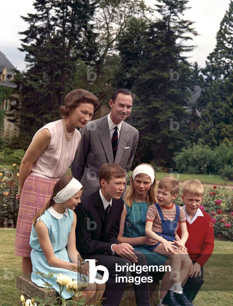 Grand Duke Jean of Luxembourg and his wife Grand Duchess Josephine-Charlotte of Luxembourg with their children in garden of Colmar-Berg castle on june 27, 1968 : l-r :  princess Margaretha, prince Henri (future Grand Duke), princess Marie Astrid with prince Guillaume, prince Jean (photo)