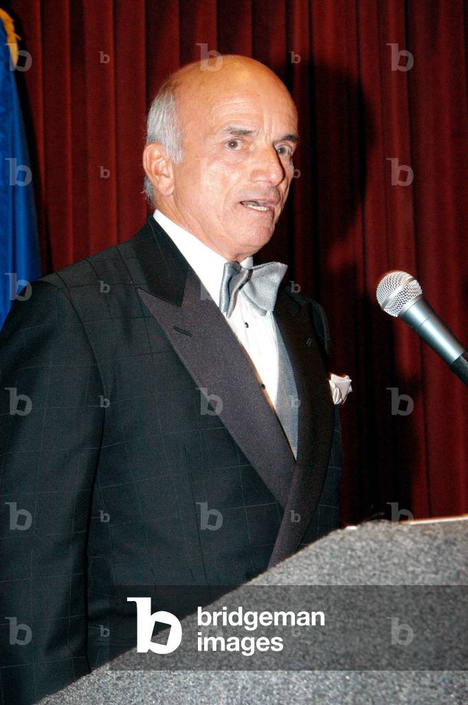 KENNEDY SPACE CENTER, FLA. - Dennis Tito, the first private citizen to visit the International Space Station, shares his experiences during the Space Congress Gala. Held April 29-May 2, 2003, in Cape Canaveral, Fla.