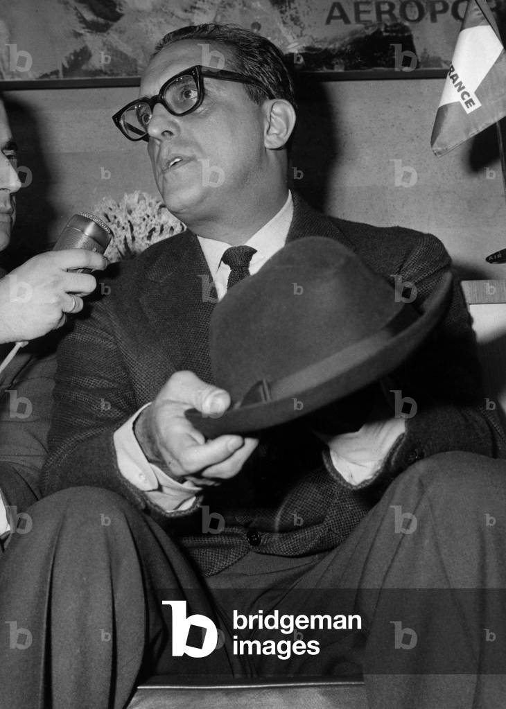 Carlos Lacerda,, governor of Rio with journalists at the airport of Orly, April 23, 1964