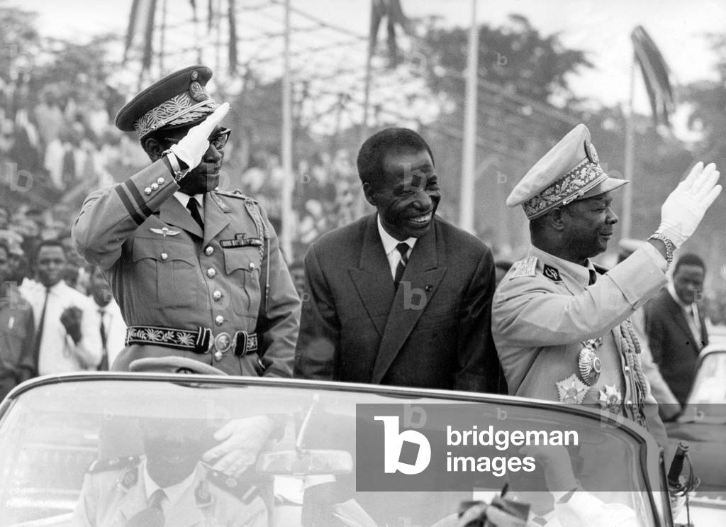 Congolese President Massamba Debat receiving President of Zaire Mobutu (l) and President of Central African Republic Bokassa (r) during visit in Congo August 19, 1966