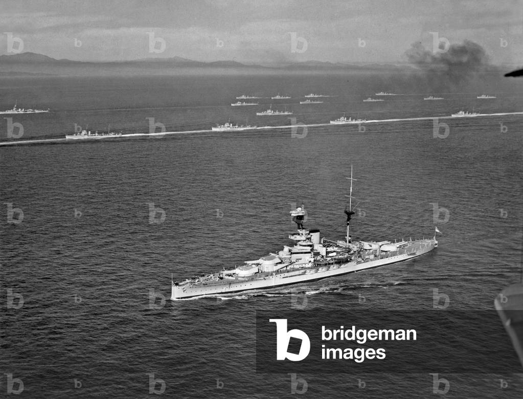 Royal Navy battleships pass through the Strait of Gibraltar.