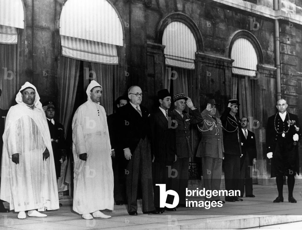 Visit in Paris of Sultan of Morocco : Sidi Mohamed Ben Youssef (Mohamed V) : l-r : General Juin, son of sultan Prince Moulay Hassan, Vincent Auriol, Morocco sultan, October 1950