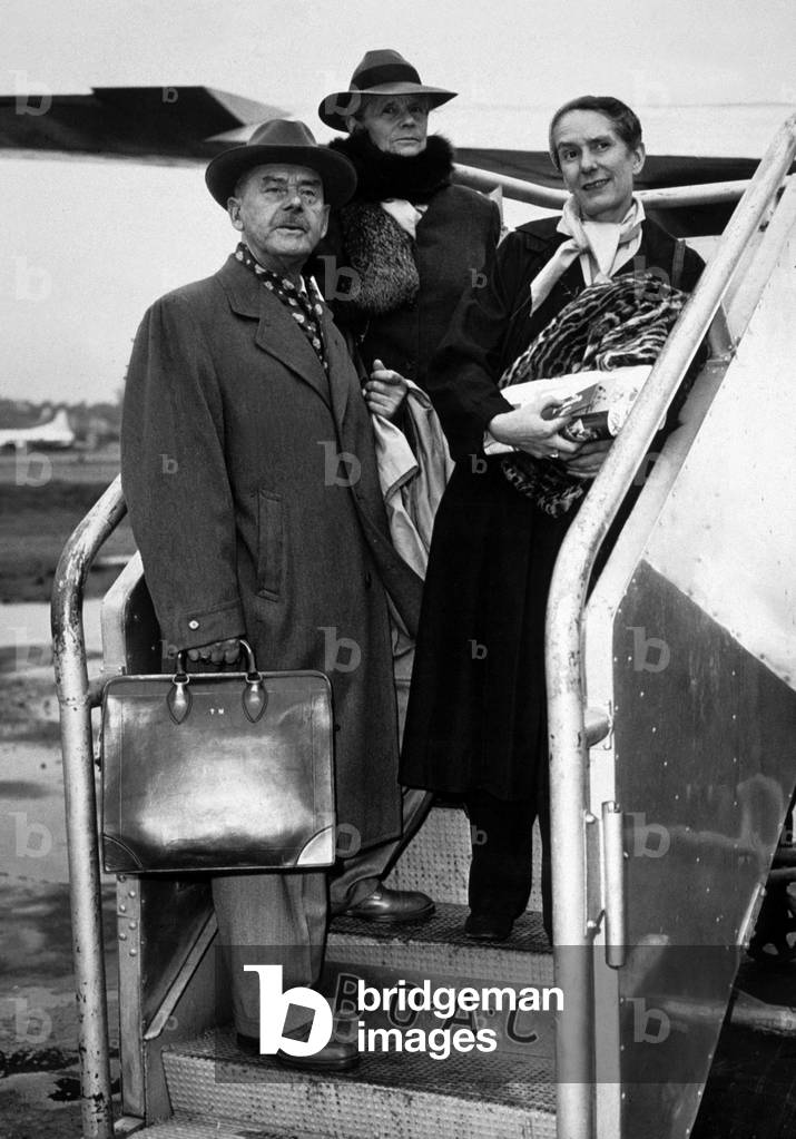 Thomas Mann, German novelist, with his wife Katja and his daughter Erika at La Guardia airport in New York for London, in 1949