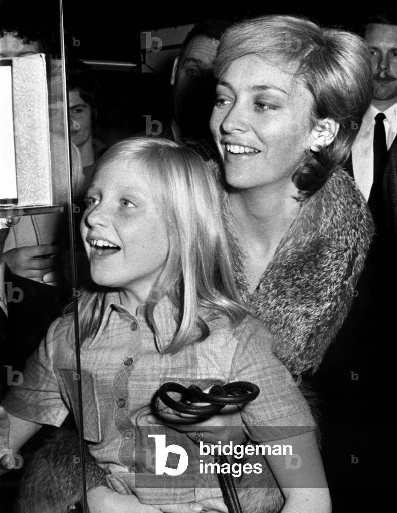 Princess Paola of Belgium and her daughter Princess Astrid at exhibition of toys in Brussels on November 5, 1970