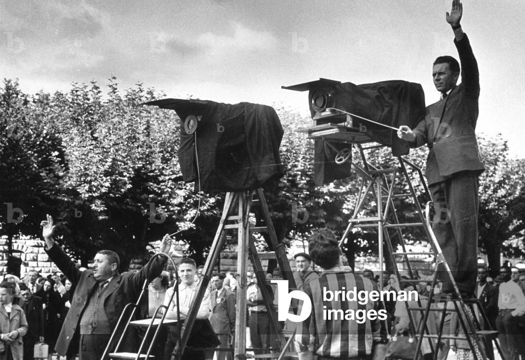 Photographers in Paris c. 1946 (they use camera with bellows)