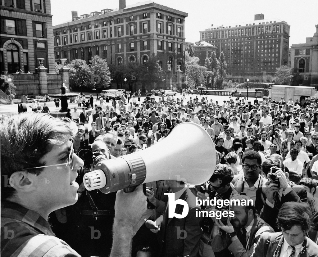 MARK RUDD, the 21 year-old leader of last springs's campus revolt at Columbia University uses a bullhorn to address incoming freshmen at Columbia Sept. 18th. New York, 9/18/68.