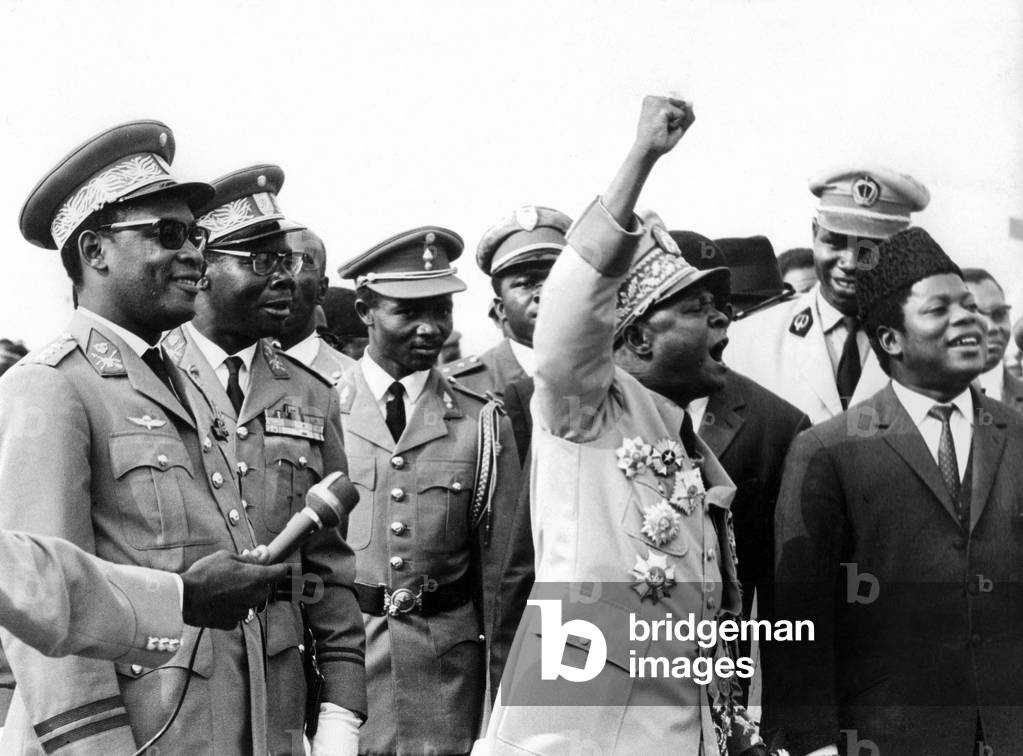 President of Zaire Mobutu (l) and President of Central Africa Bokassa (arm raised) during visit in Congo August 19, 1966 dictature dictateur dictator