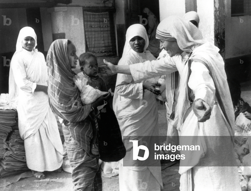 Mother Teresa (1910-1997) peace Nobel prize in 1979, her with underpriviledged people of Calcutta in the 70's