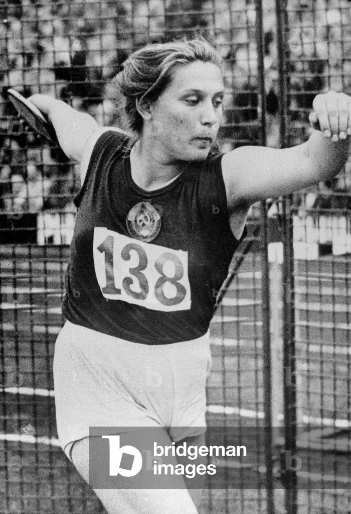 Soviet athlete Tamara Press throwing the discus during Athletics championships in Sweden August 23, 1958