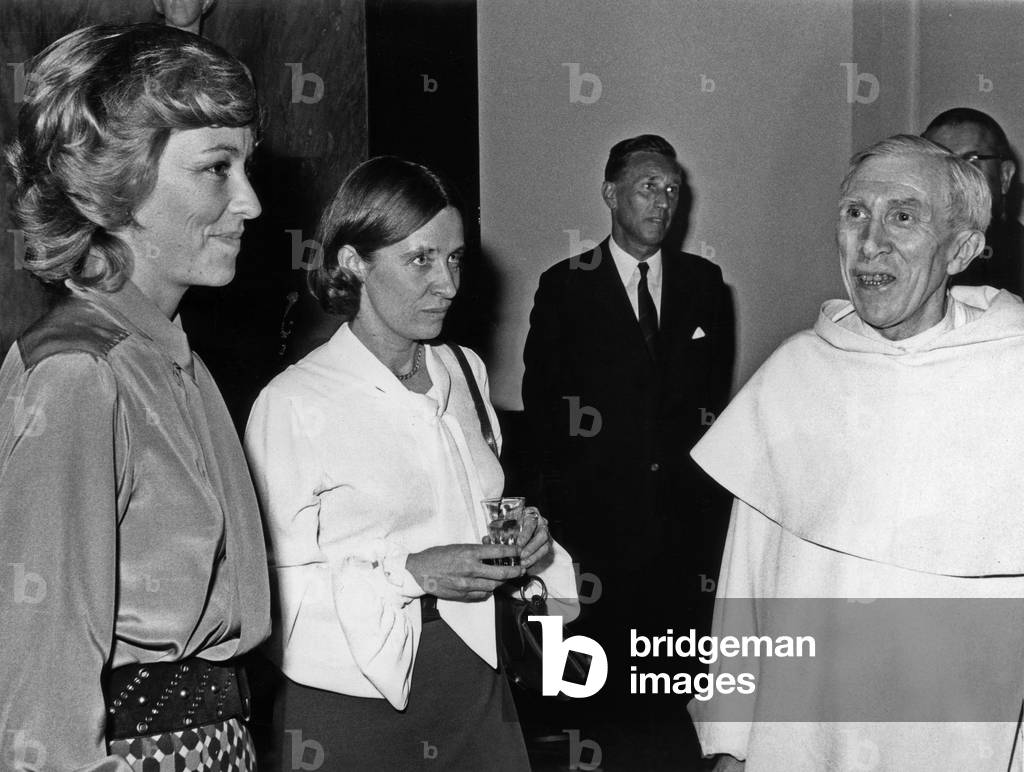 Princess Paola of Belgium (future queen) with priest Father Carre and Francoise Mallet-Joris at reception in Brussels, May 13, 1971