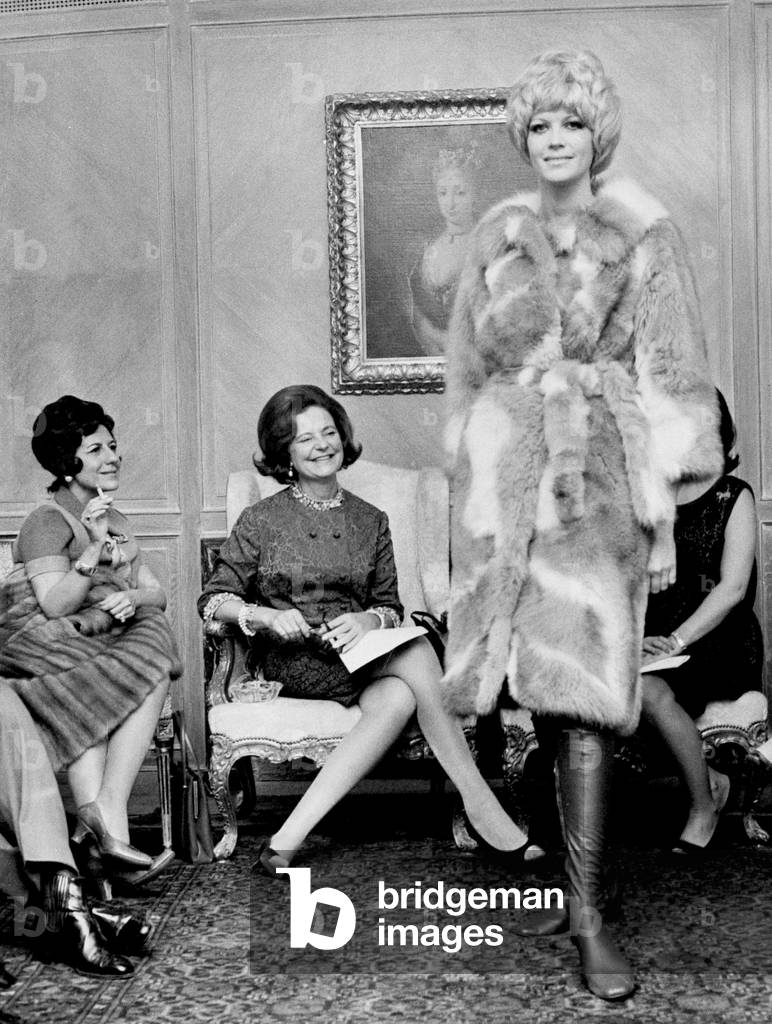 French poet Fina de Calderon and Queen Geraldine of Albania at fashion fur show in Madrid November 3, 1967