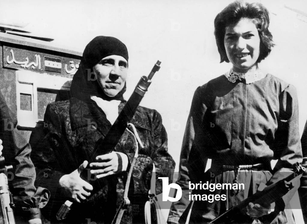 Distribution of firearms to women of the Syrian Army after the bloodless pro-nasserian putsch in Damascus August 31, 1963 which aborted the project of a UAR (United Arab Republic) - Iraq - Syria federation
