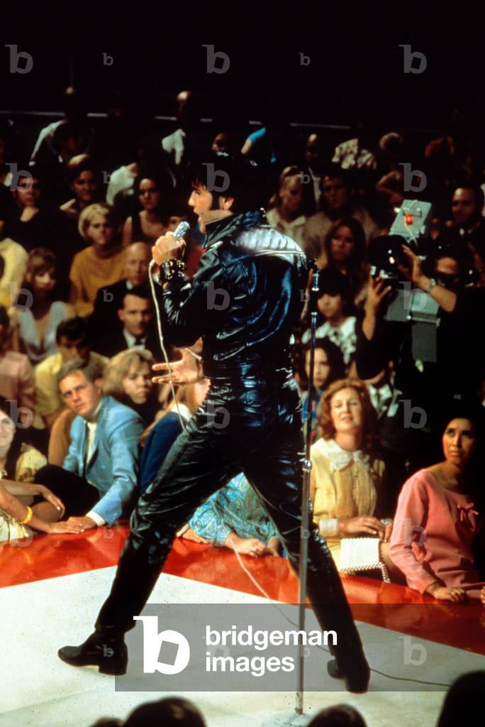 Elvis Presley on stage c. 1968
